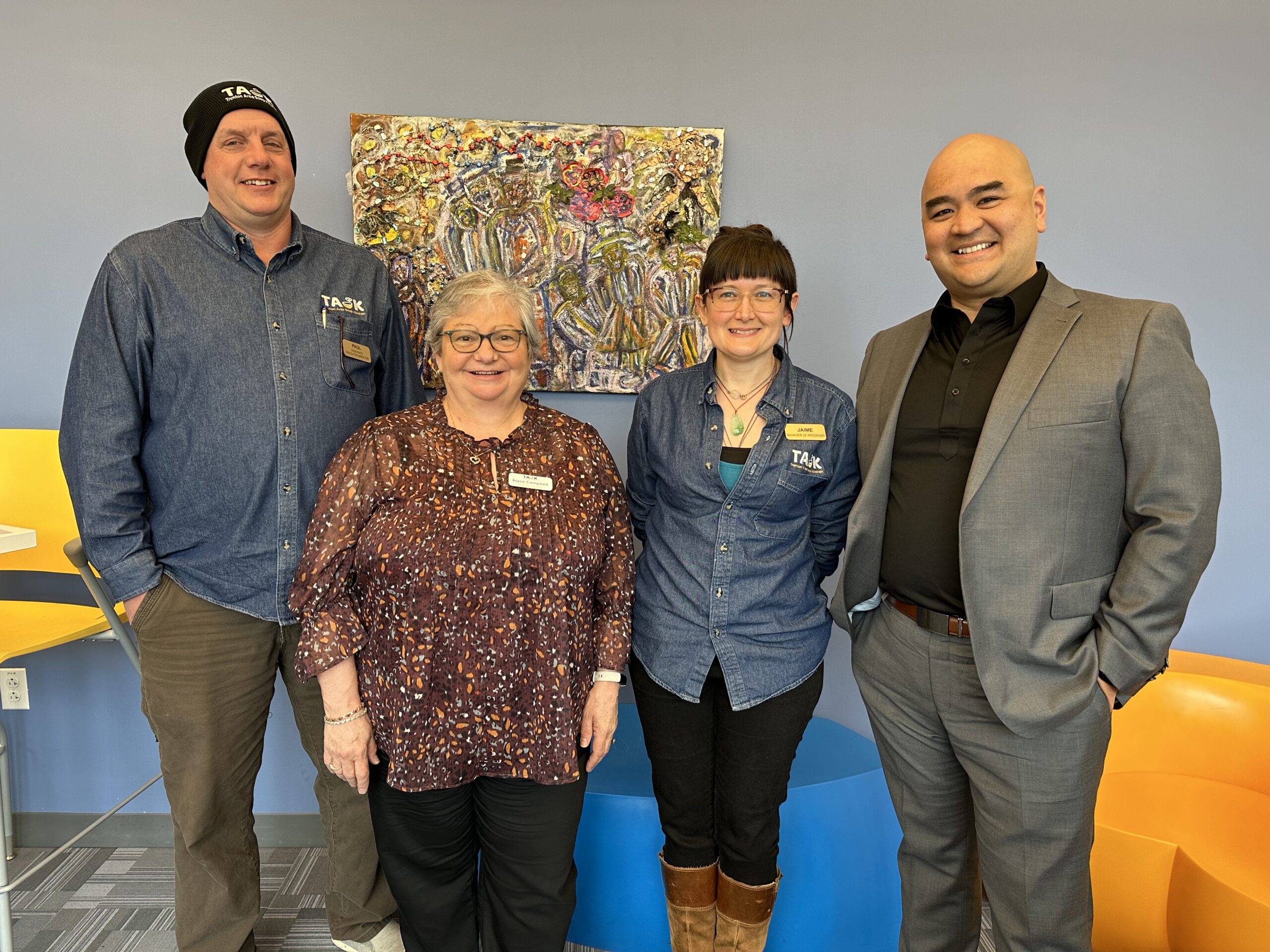 Mark Dinglasan, Director of the New Jersey Office of the Food Security Advocate, poses with TASK Associate Executive Director of Operations, Paul Jensen; TASK Executive Director, Joyce Campbell; and TASK Director of Programs & Services, Jaime Parker.